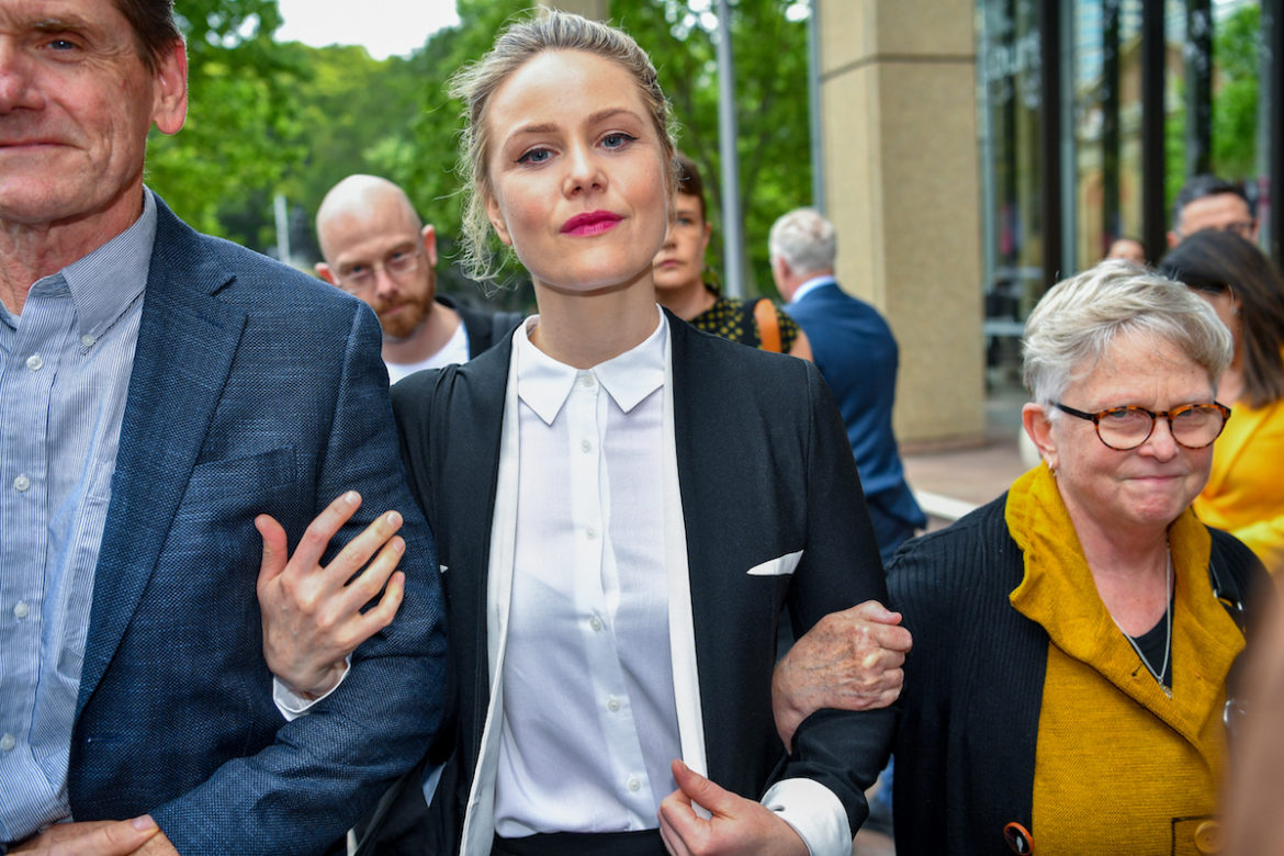 Actor Eryn Jean Norvill (centre) leaving the Federal Courts after giving evidence in the Geoffrey Rush defamation case in Sydney. Photo: AAP Image/Brendan Esposito