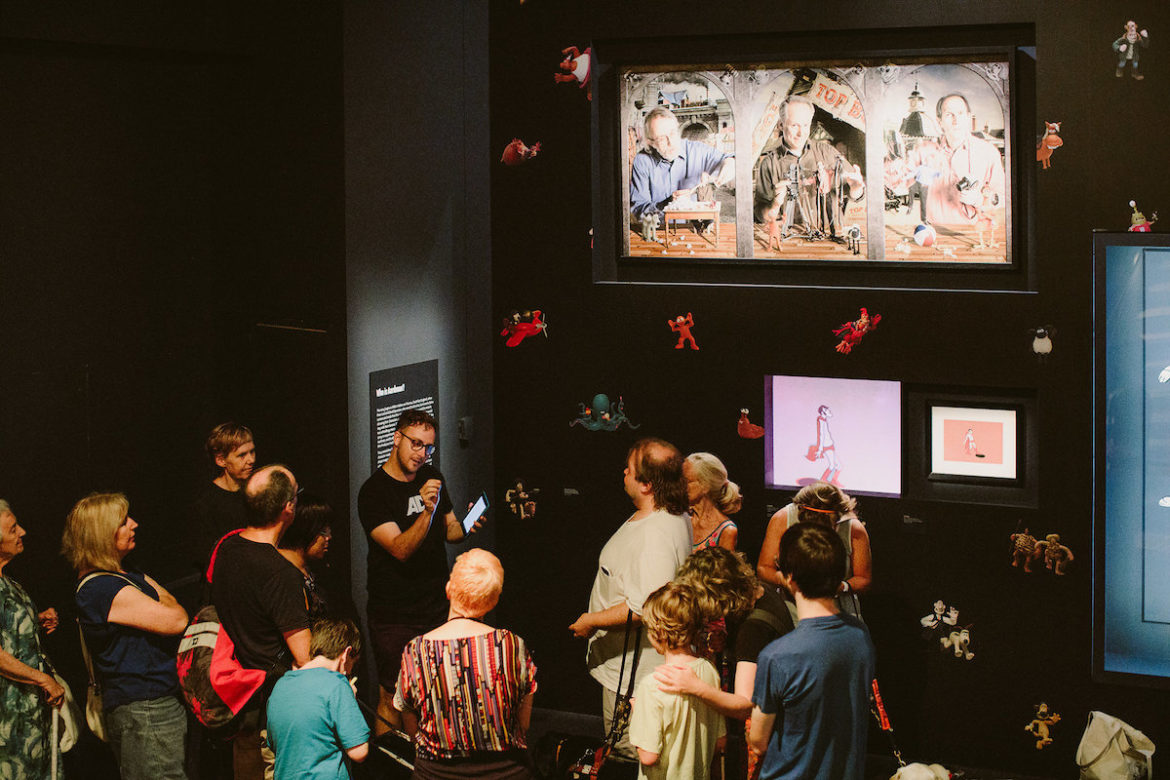 Audio describer Will McRostie leading a tour of the Wonderful World of Aardman exhibition at ACMI. Photo: Kate Pardey Photography